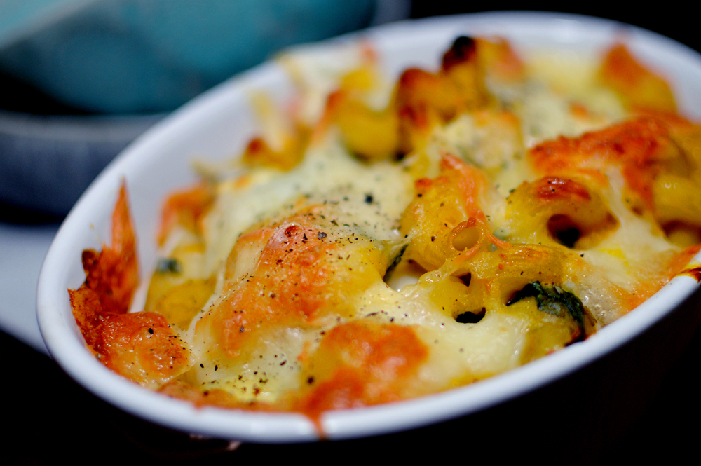 Autumnal recipe for butternut squash, sage, sausage and cheese pasta bake that can be made vegetarian